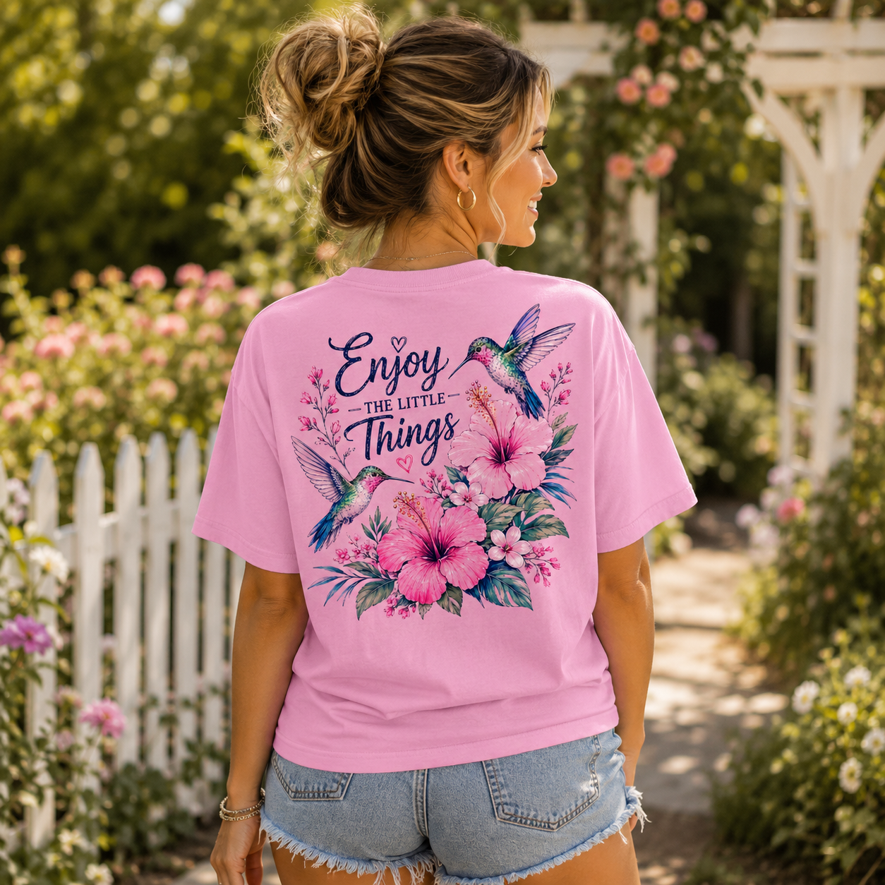 Woman wearing an Enjoy The Little things Hummingbird Back Porch Apparel Shirt