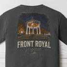 A dark charcoal gray t-shirt shown from the back, featuring a graphic print of the Front Royal Virginia gazebo at night with the text 'FRONT ROYAL Virginia' and 'SMALL TOWN BIG HEART.'.