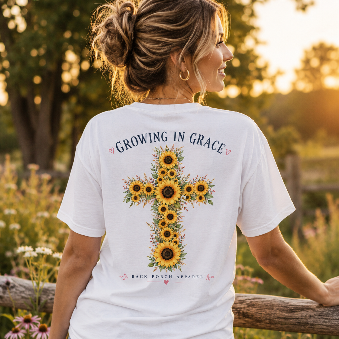 Woman wearing a Growing in Grace Back Porch Apparel Sunflower Shirt