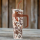 Myra Wide Wyoming 40oz Stainless Steel Tumbler in Brown and White Cow