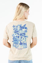 Simply Southern mineral wash bone t-shirt with blue coastal icons graphic on back and small sea turtle graphic on front