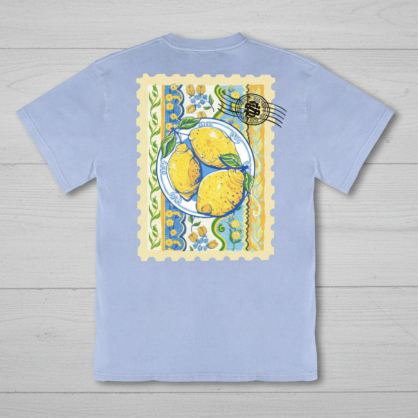 Simply Southern mineral washed faded blue t-shirt featuring a lemon stamp graphic on the back