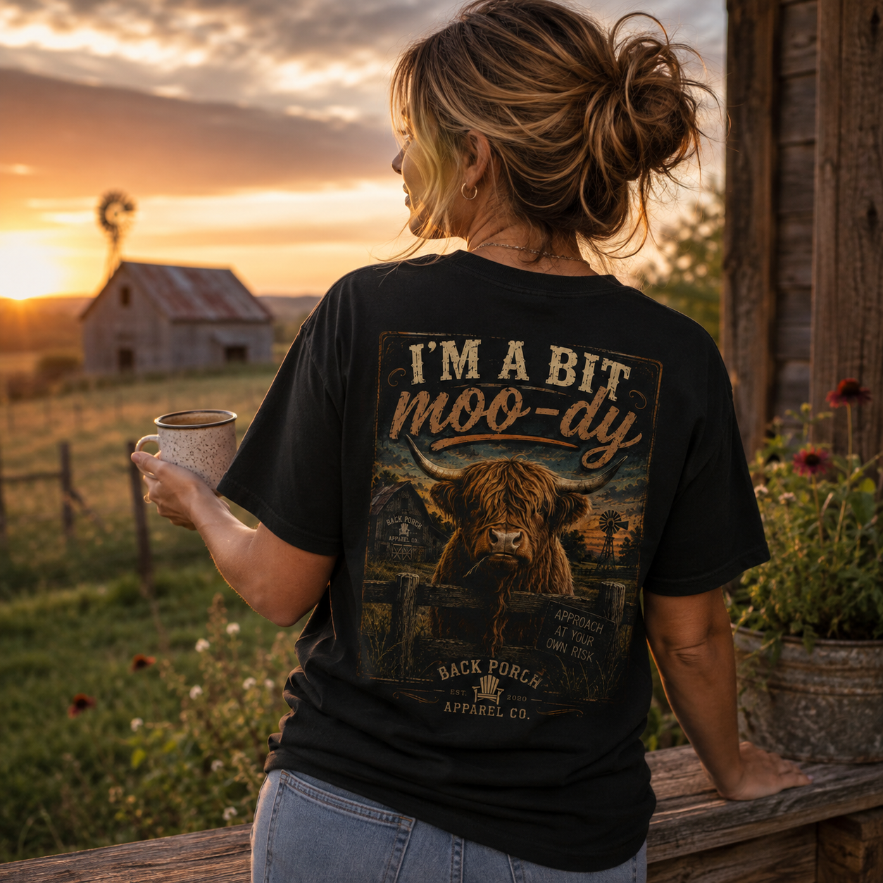 Woman wearing Highland Cown I'm A bit Mood-dy Back Porch Apparel Comfort Colros shirt