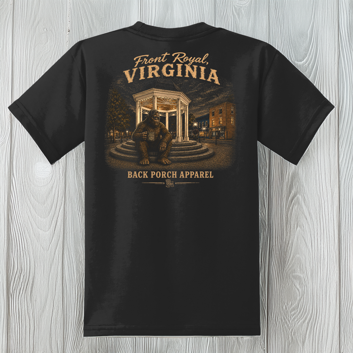 Kids Bigfoot in Front Royal graphic t-shirt with a vintage Virginia downtown scene on a black youth tee.
