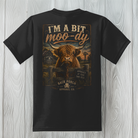 Youth Moody Highland Cow t-shirt on a black 50/50 blend tee featuring a vintage Highland cow graphic.