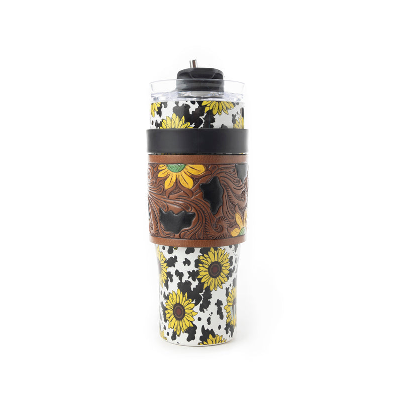 Myra Wide Wyoming 40oz Stainless Steel Tumbler Black and White Cow with Sunflowers and Hand Tooled Leather