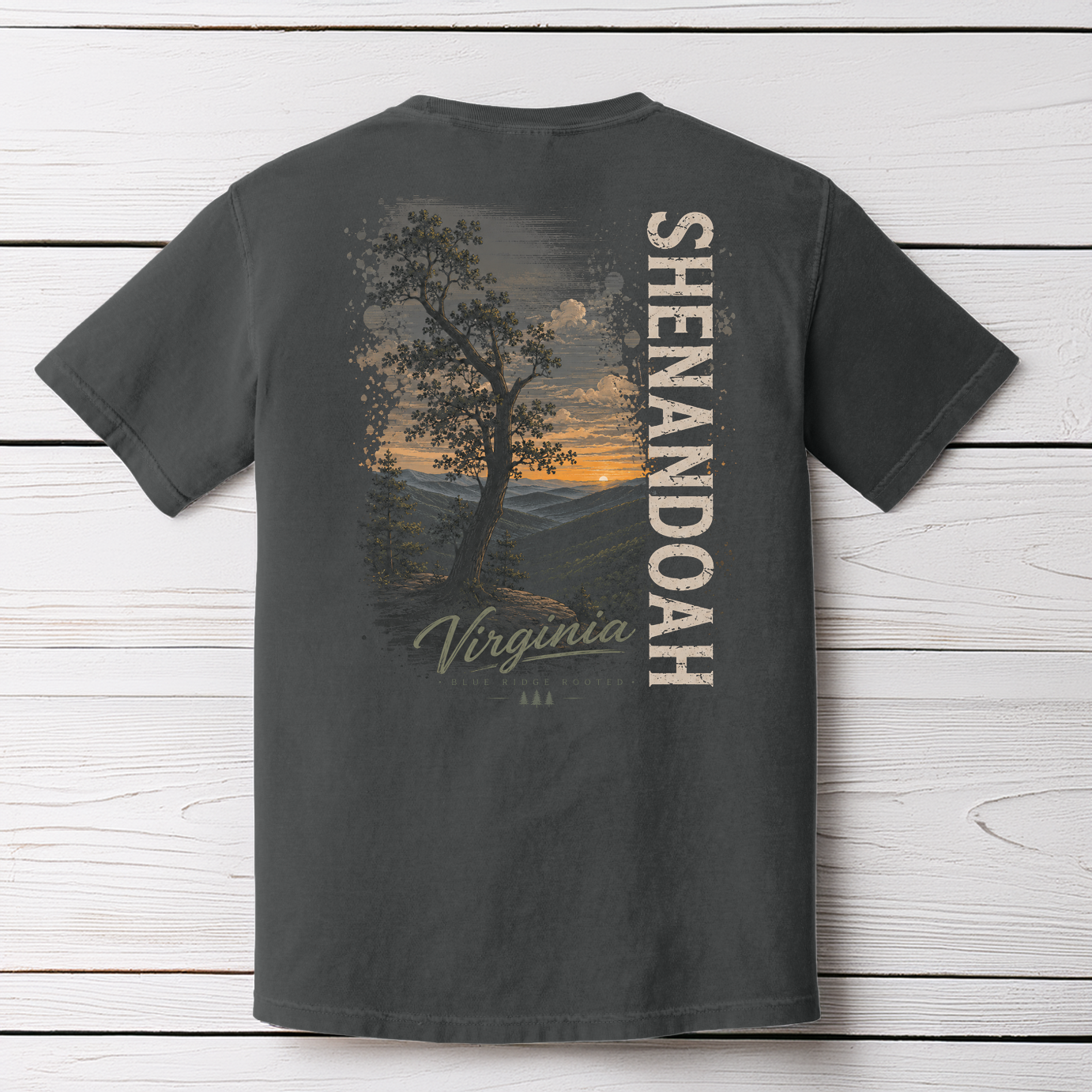 Comfort Colors Pepper Shenandoah Virginia t-shirt displayed on wood background featuring Blue Ridge sunset artwork.