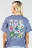 Model wearing Simply Southern denim blue t-shirt with Create the Day You Desire postcard collage back graphic