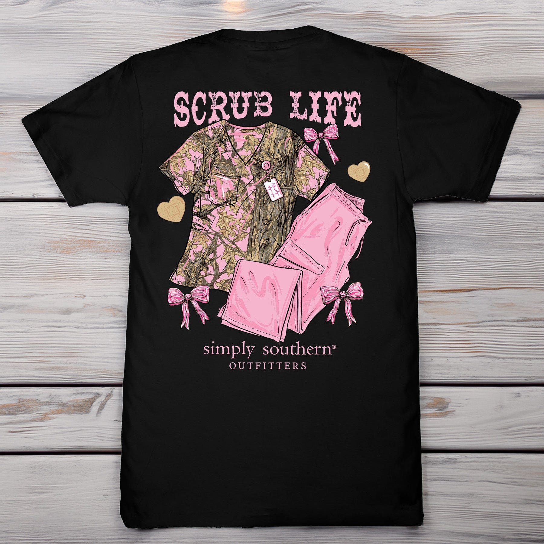 Simply Southern black short sleeve t-shirt featuring pink camo scrubs and “Scrub Life” text on back