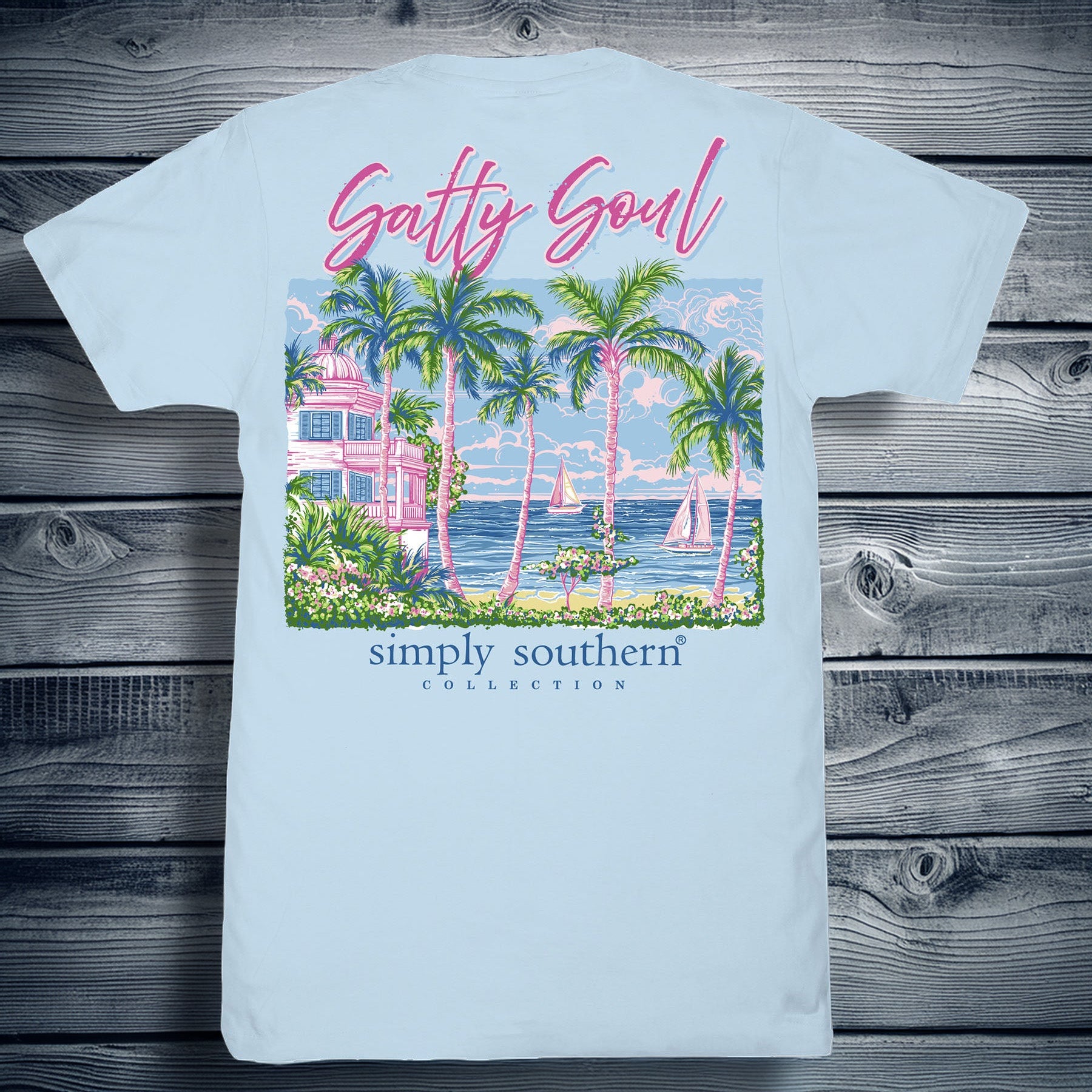 Simply Southern Salty Soul ice blue short sleeve cotton tee with palm trees, coastal house, sailboats, and ocean scene graphic
