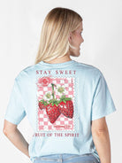 Model wearing Simply Southern Stay Sweet faith-inspired strawberry graphic t-shirt