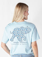 Model wearing Simply Southern elephant animal conservation T-shirt showing back wildlife design