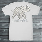 Simply Southern Conserve & Protect elephant graphic with bow pattern on light-colored short sleeve t-shirt