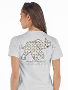 Simply Southern Conserve & Protect elephant graphic with bow pattern on light-colored short sleeve t-shirt