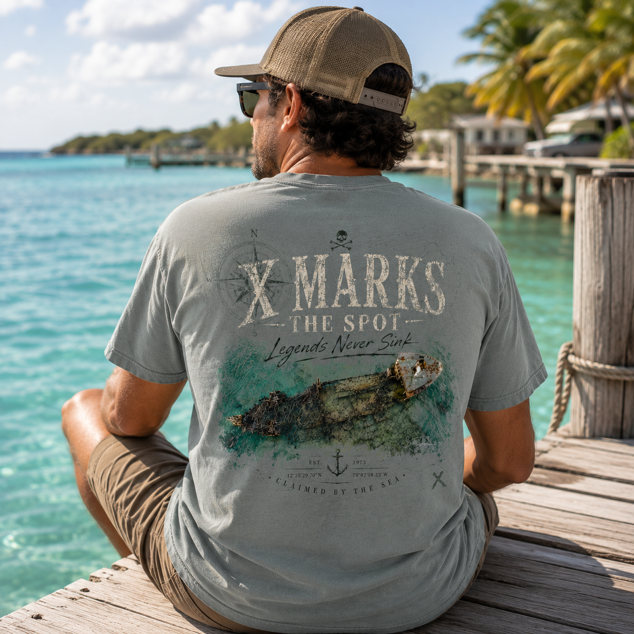 Man wearing a X Marks The Spot Back Porch Apparel Comfort Colors Shirt