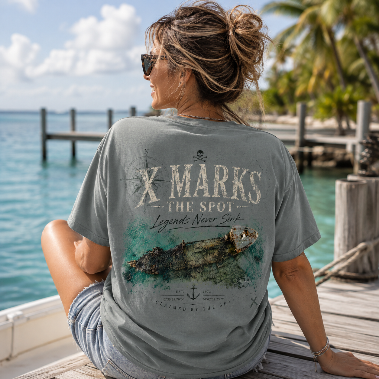 Woman wearing a X Marks The Spot Back Porch Apparel Comfort Colors Shirt