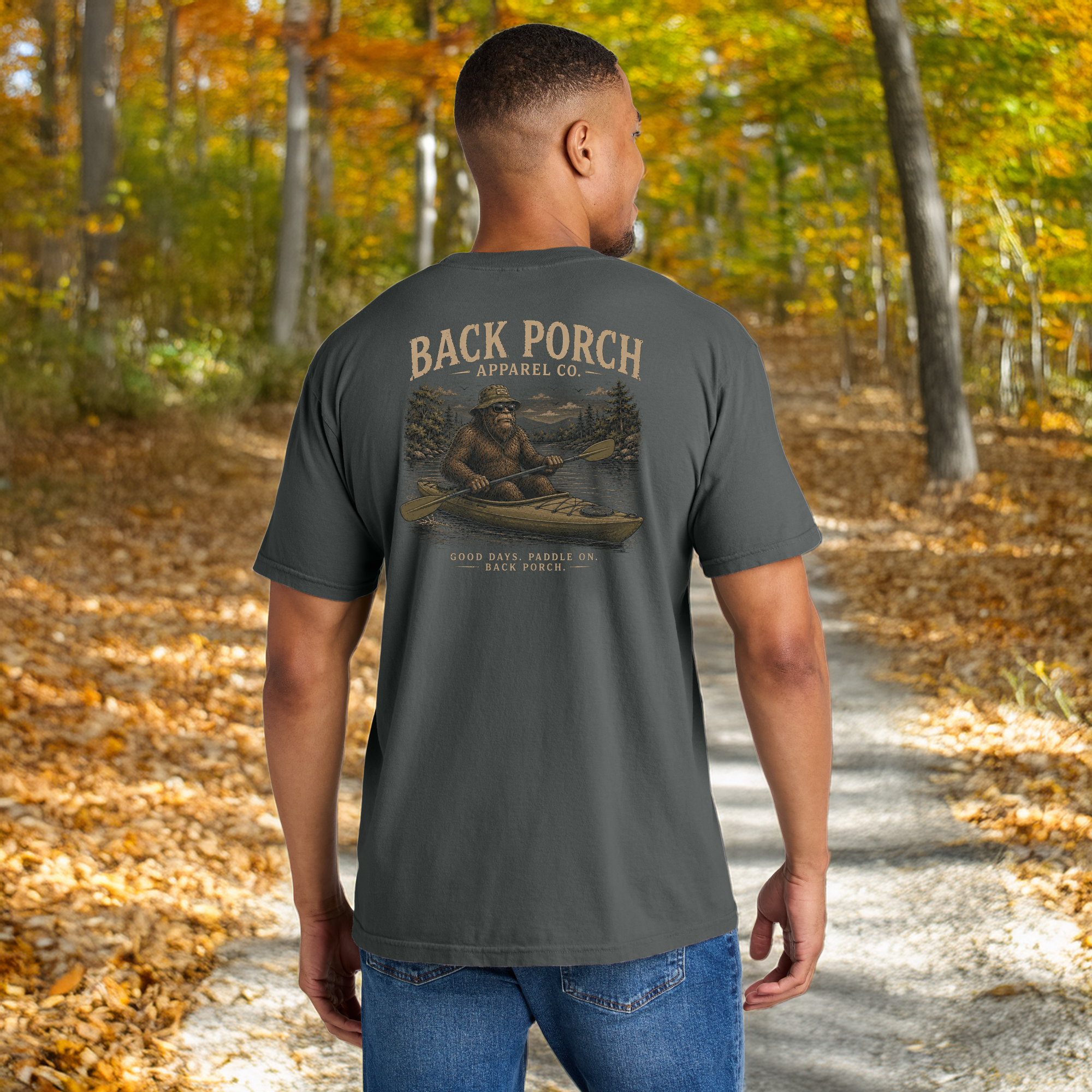 Model wearing Bigfoot Kayaking Comfort Colors Pepper T-Shirt