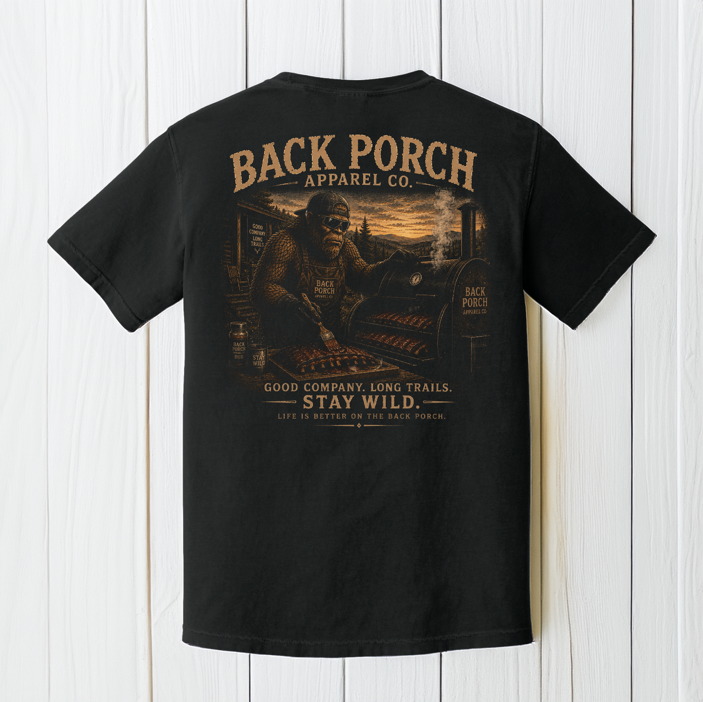 Bigfoot BBQ pitmaster graphic t-shirt on Comfort Colors garment-dyed tee featuring Sasquatch smoking barbecue full shirt