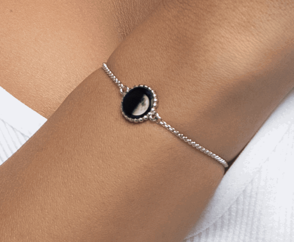 Celestial Elegance: Moonglow Carina Twist Bracelet in Stainless Steel