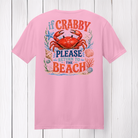 If Crabby Please Return To The Beach graphic t-shirt featuring a bright red crab surrounded by seashells, coral, and coastal beach artwork