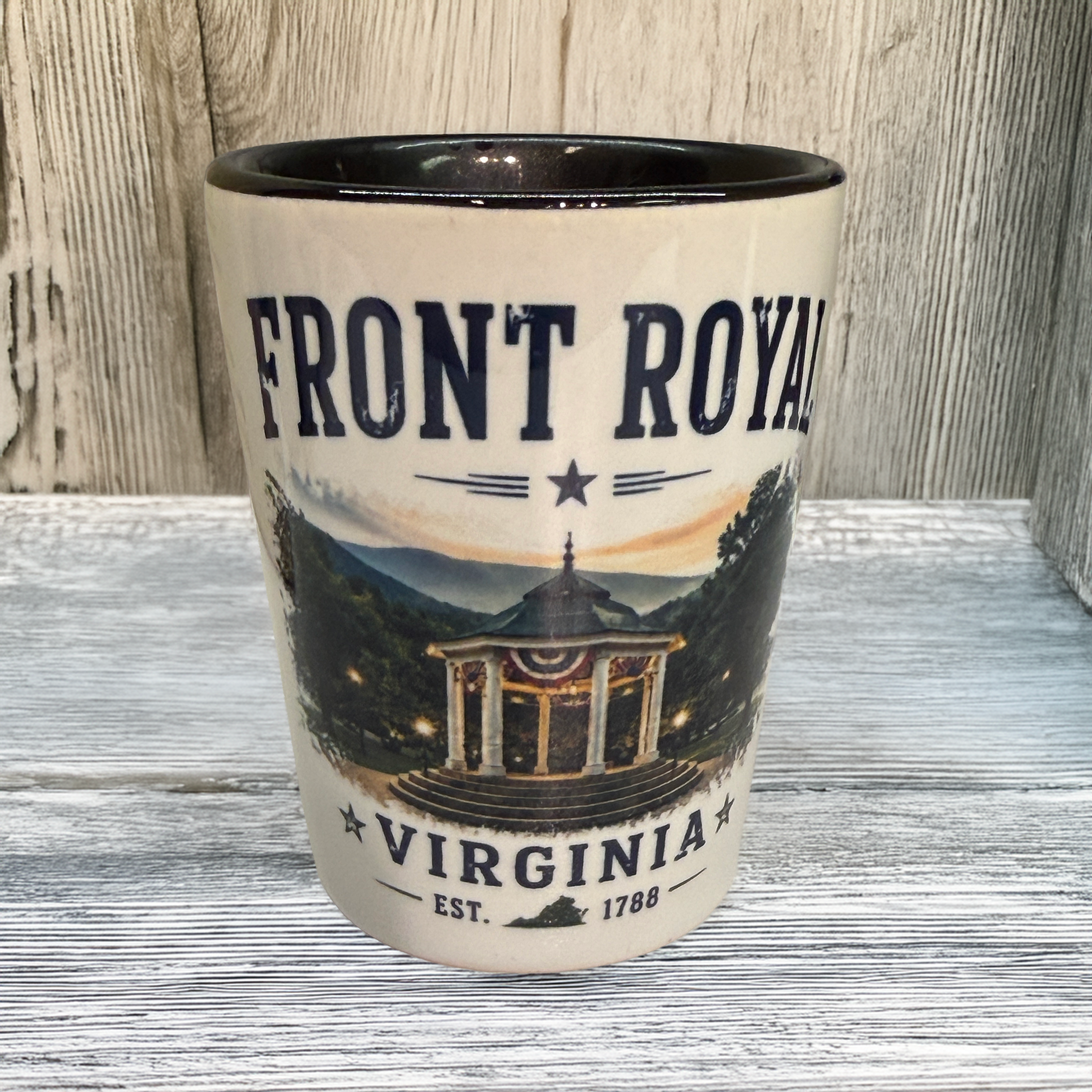 Front Royal Virginia ceramic shot glass featuring the historic gazebo with Blue Ridge Mountains in the background.