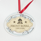 Front Royal Virginia layered wood snowflake ornament with engraved gazebo design, white snowflake frame, natural wood center, and red hanging ribbon.