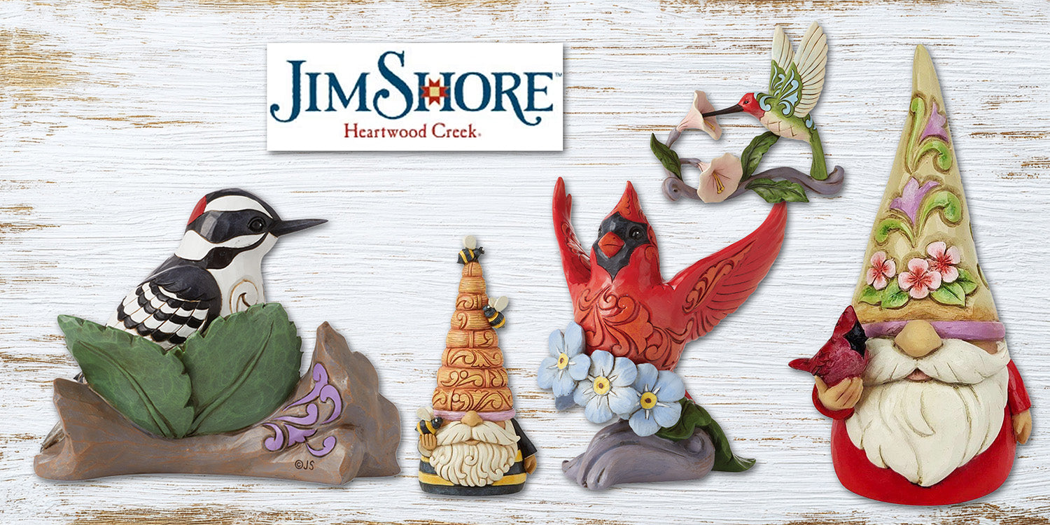 Jim Shore figurines featuring handcrafted folk-art designs and traditional patterns.