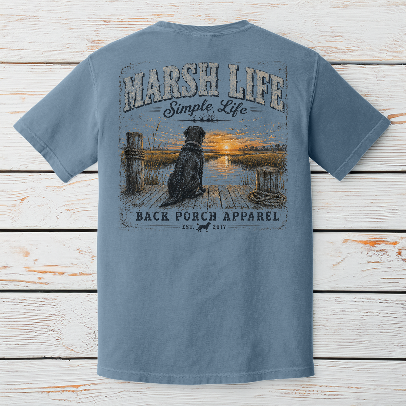 Coastal marsh artwork featuring a black Labrador watching a sunset over tidal waterways with Marsh Life Simple Life slogan