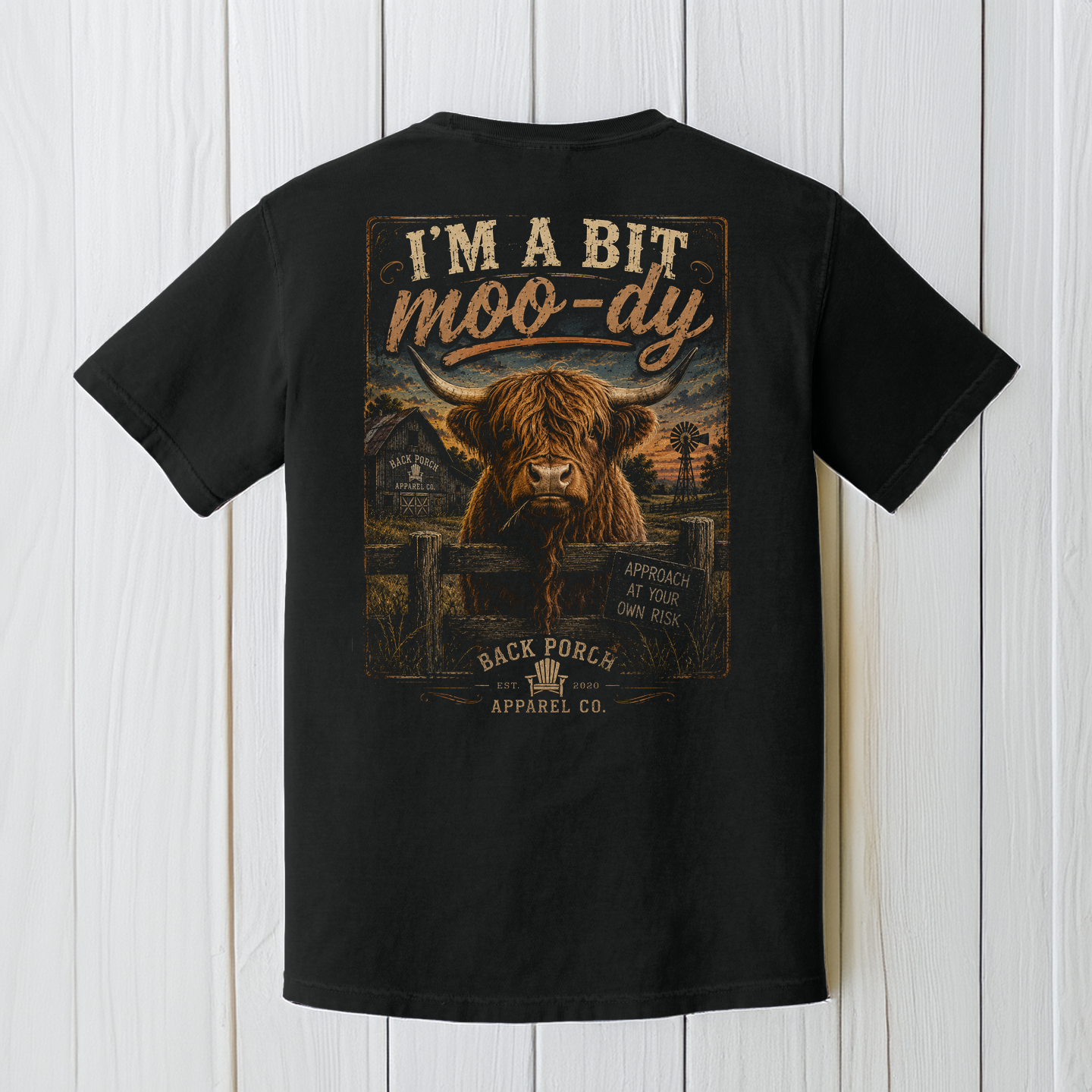 Funny Highland cow artwork with I'm A Bit Moo-dy slogan and Approach At Your Own Risk sign on a rustic farm scene