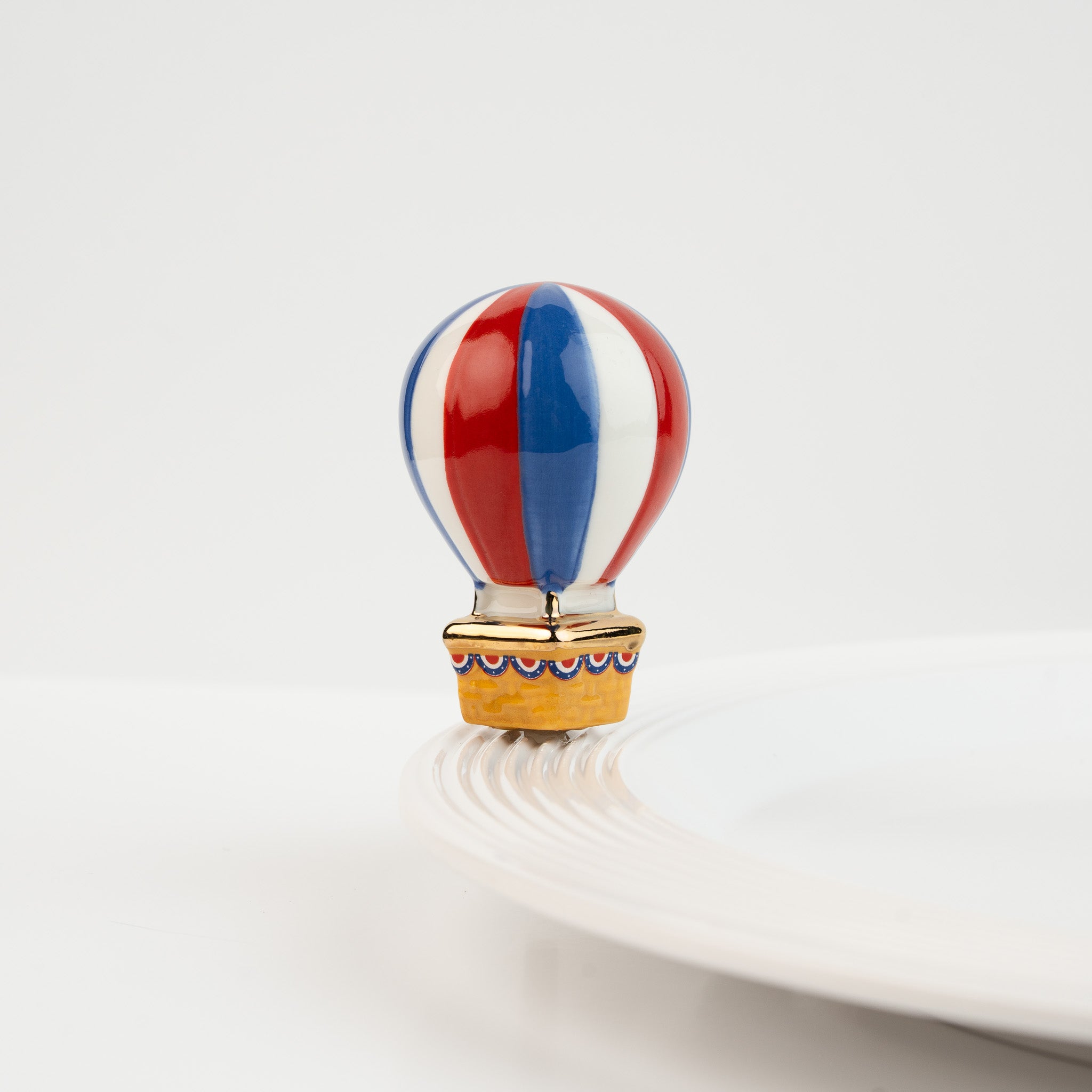 Nora Fleming Red White and Balloon hot air balloon mini on Nora Fleming platter