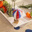 Nora Fleming Red White and Balloon hot air balloon mini on Nora Fleming platter