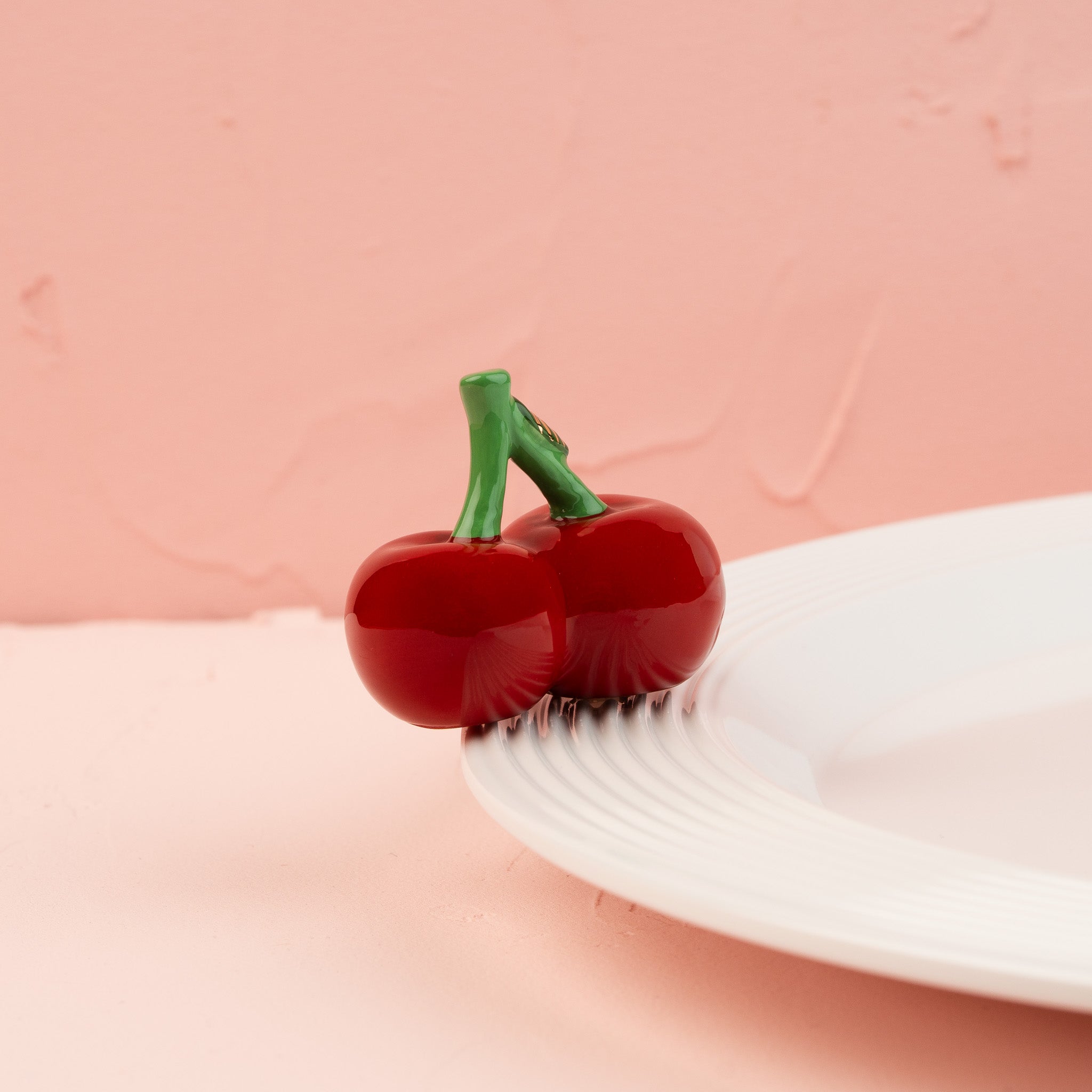 Front view of the Nora Fleming Cheery Cherries Mini showcasing vibrant red cherries with detailed green stems