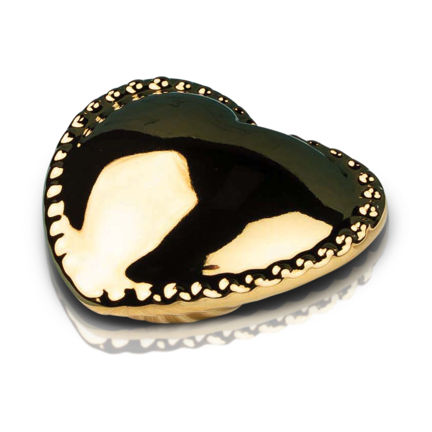 Nora Fleming Luxe Hospitality metallic bronze pineapple mini displayed on the Plato Ovalado serving platter