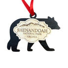 Layered wooden Shenandoah National Park bear ornament with engraved mountain artwork and natural wood centerpiece isolated on a white background.