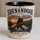 Ceramic shot glass featuring a bald eagle perched above the Shenandoah River at sunset with Front Royal Virginia typography and a black interior.