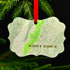 Shenandoah National Park metal ornament with red ribbon, featuring mountain landscape on front and park map with coordinates on back