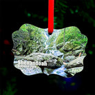 Shenandoah National Park waterfall metal ornament with red ribbon, featuring forest stream and cascading waterfall on front and park map with coordinates on back
