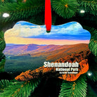 Shenandoah National Park metal ornament with red ribbon, featuring mountain landscape on front and park map with coordinates on back