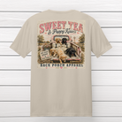 Sweet Tea and Puppy Kisses graphic t-shirt featuring Labrador Retriever puppies sitting in the bed of a vintage pickup truck